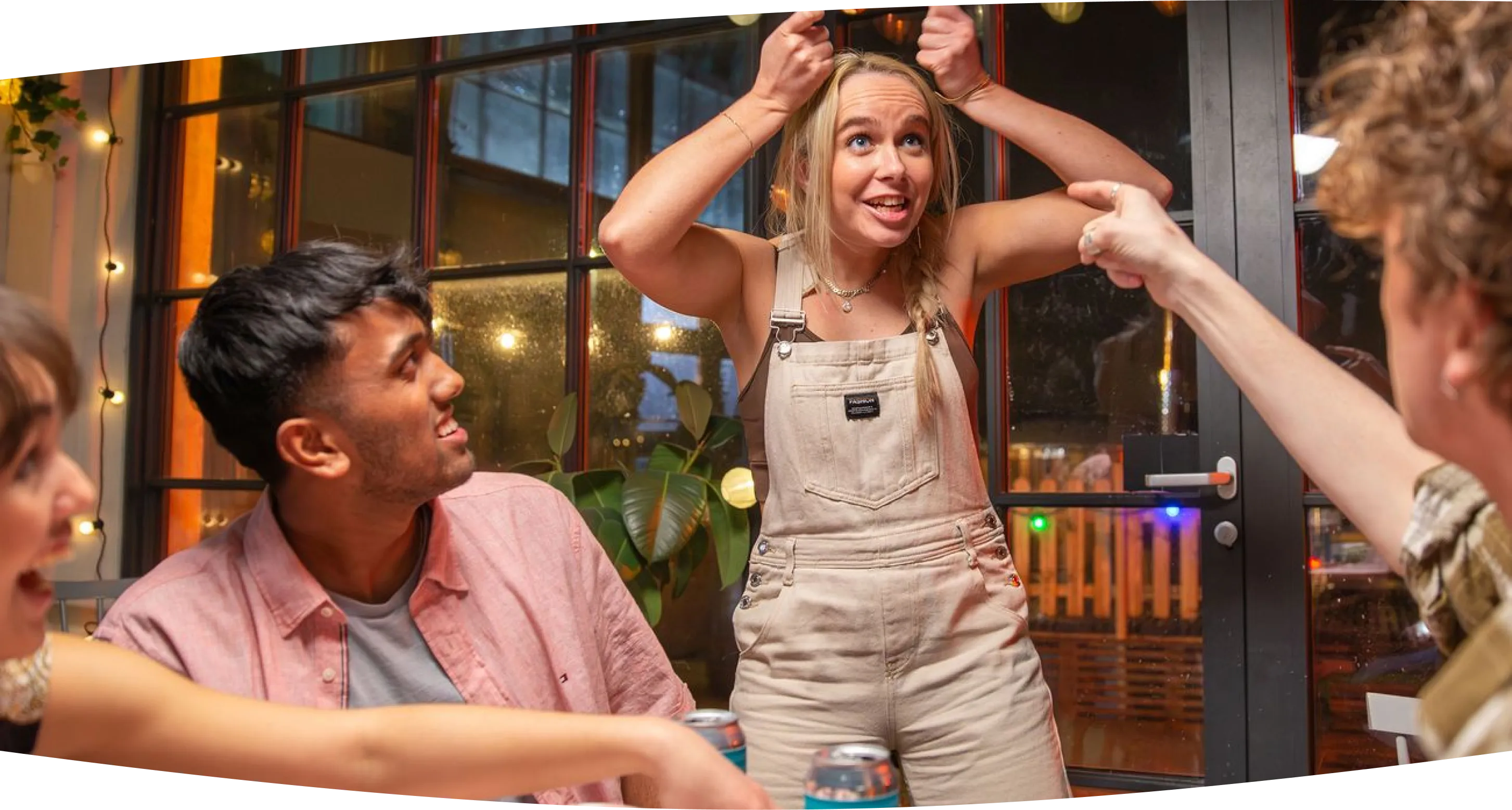 Friends playing dnup card game together